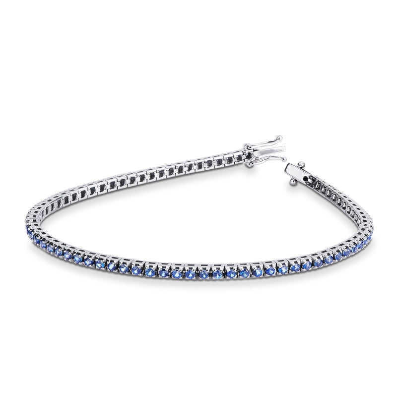 Bracciale Tennis a griffe in oro Bianco 18k con Zaffiri Blu